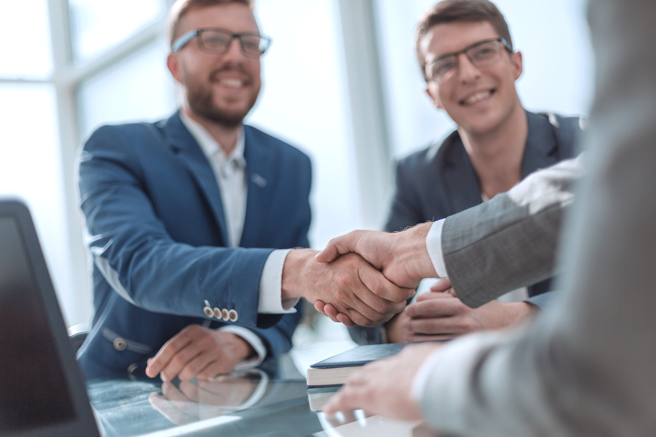 business men shaking hands
